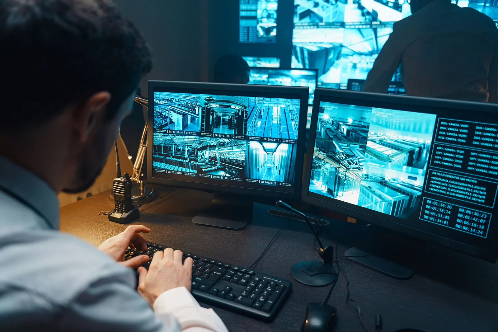 security-guard-watches-security-surveillance-monitoring-system