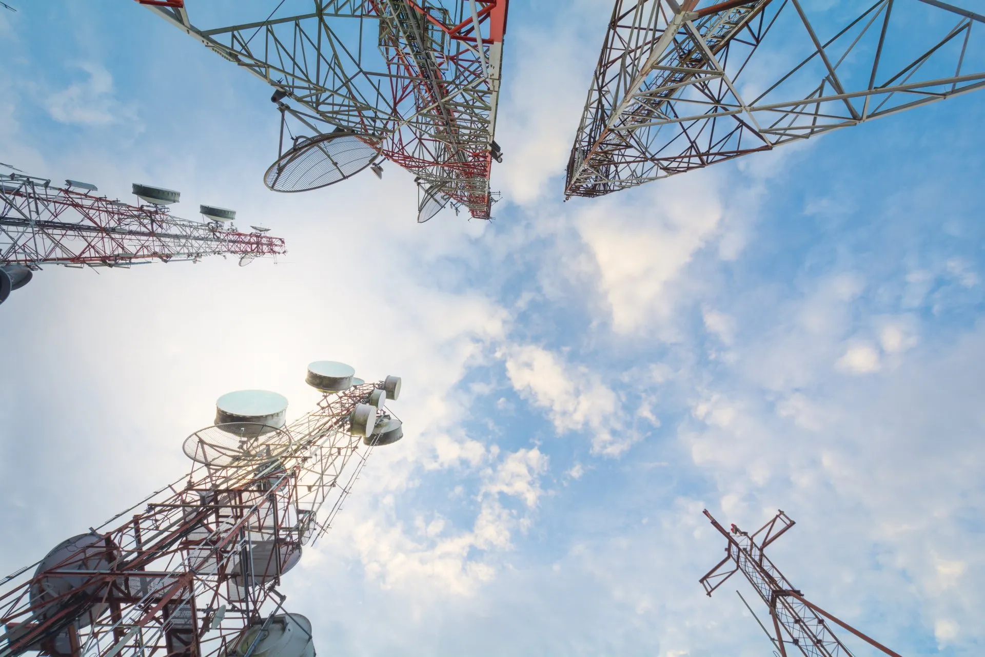 telecommunication-tower-with-antennas-with-blue-sky-morning-sunlight-1920w